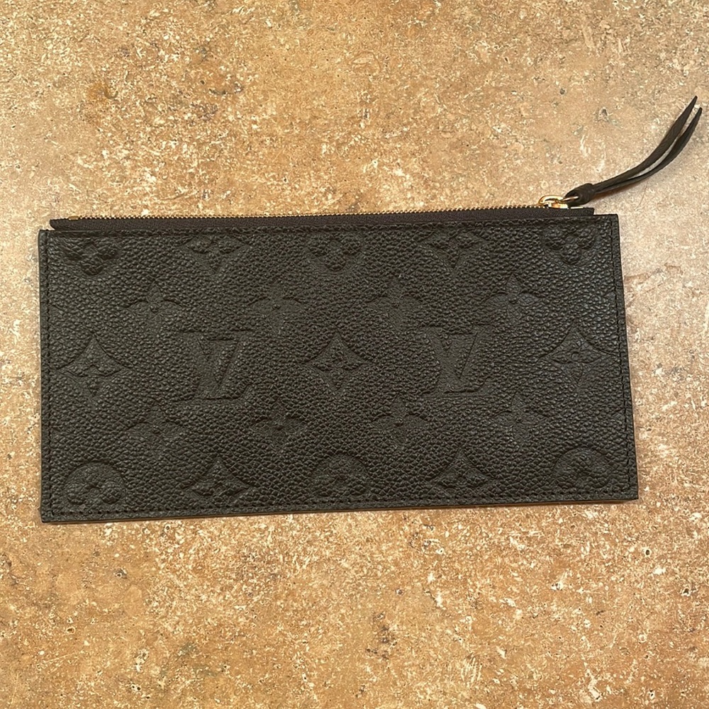 Louis Vuitton Black leather/ gold zipper insert. Never used.
